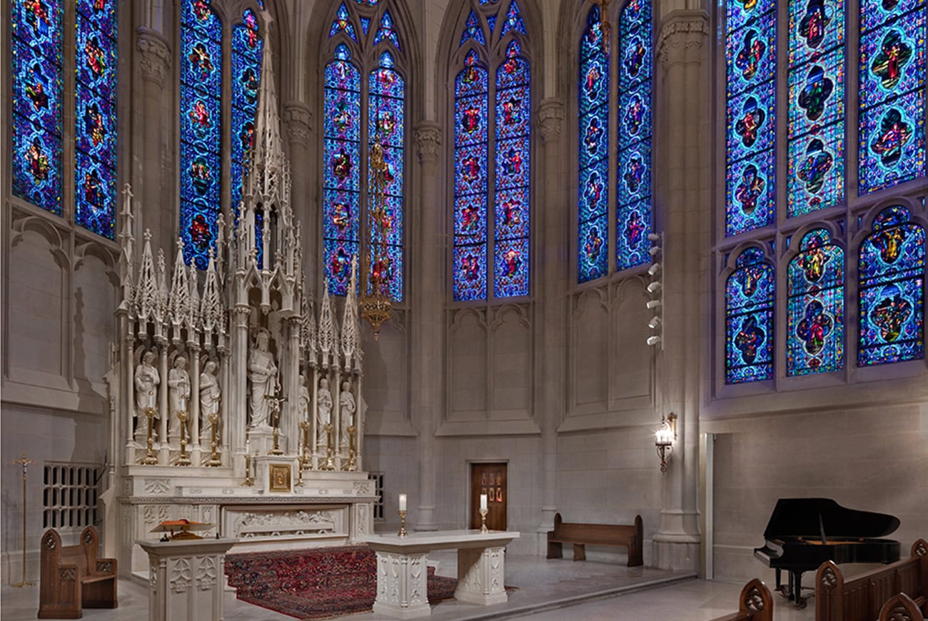 The vaulted interior and stained-glass windows of Saint James Chapel